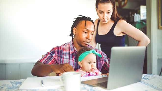 couple planning a budget with a baby